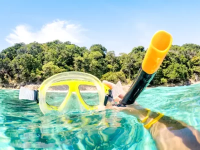 adventurous-guy-taking-photo-of-snorkeling-mask-un-2024-07-03-02-44-12-utc.webp